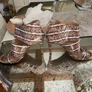 Jessica Simpson booties, size 9, 4 inch heels. Pre-loved, in fair condition.